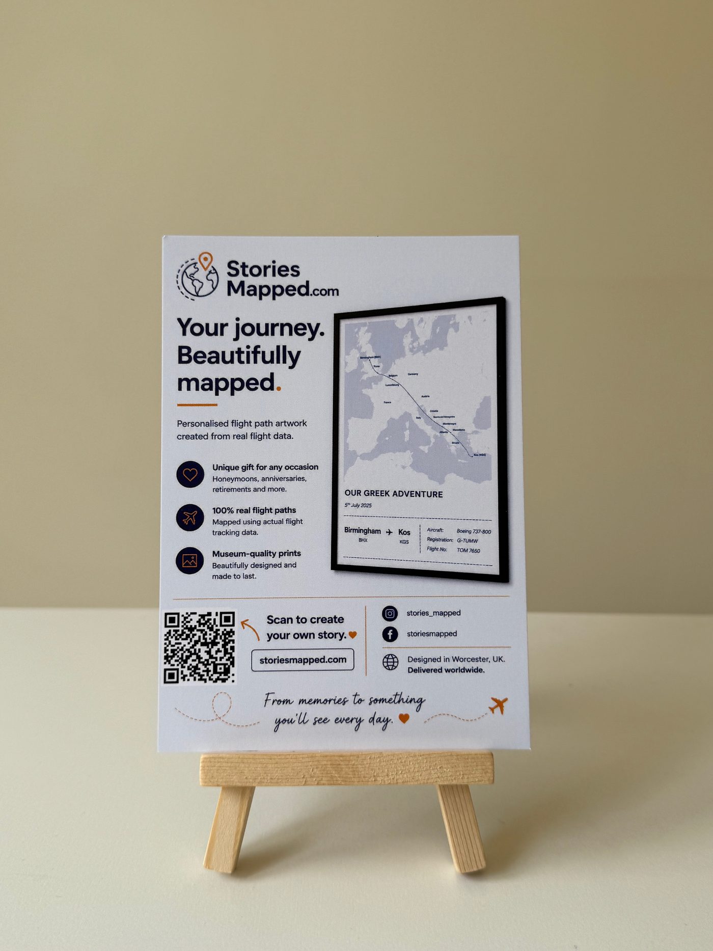 Printed Stories Mapped postcard leaflet displayed on a small easel
