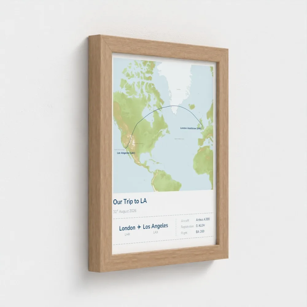 Small natural oak framed Stories Mapped print in the Relief map style, angled on a wall
